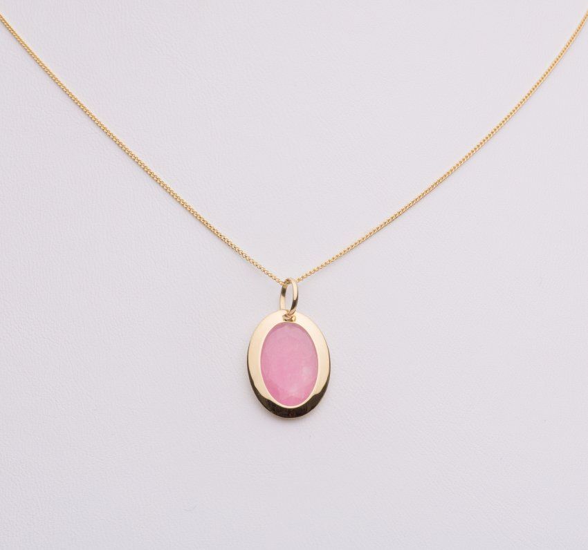 Colgante de oro de 18 Kt con cuarzo rosa.